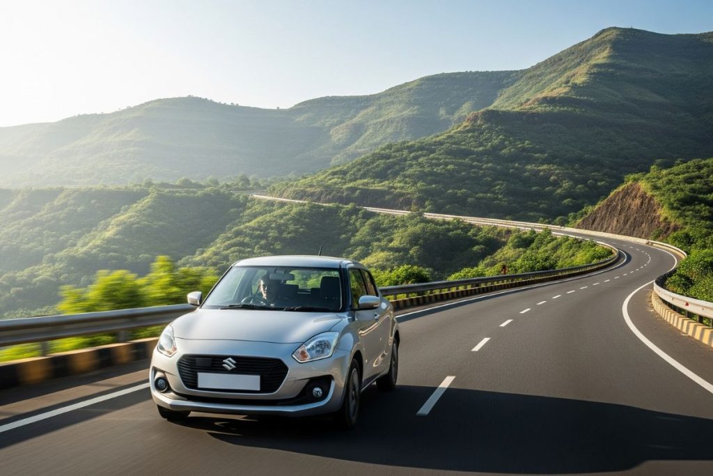 A car driving on the scenic Mumbai-Nashik highway towards Igatpuri, with green hills in the background]